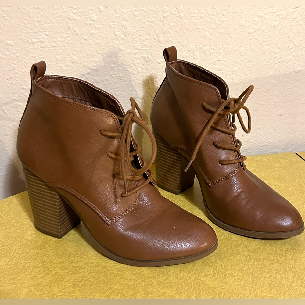 Brown lace up heeled booties